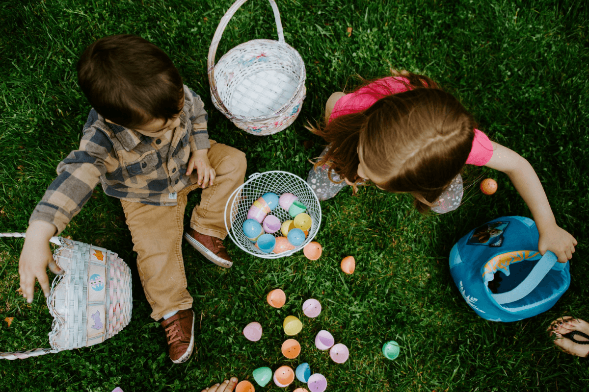 Two Children counting Easter Eggs from a Easter Egg Hunt