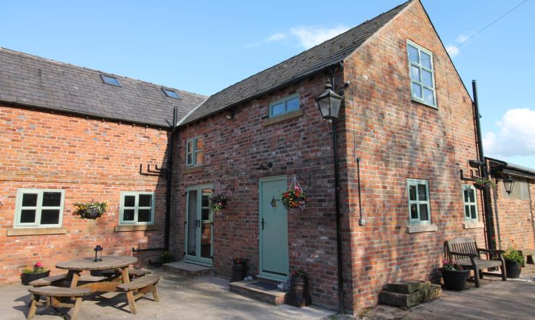 Traditional brick cottage in Goostrey and Lower Withington countryside
