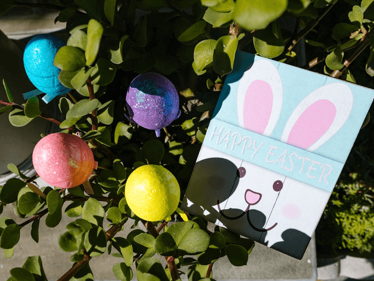 Happy Easter Card with Easter Eggs in a plant