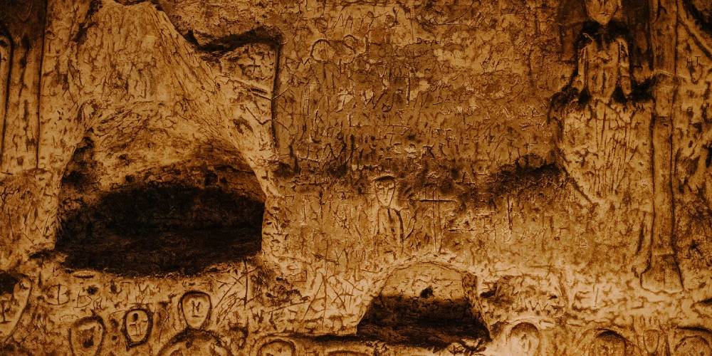 Ancient carvings and inscriptions inside Royston Cave