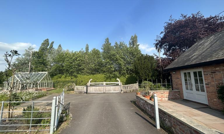 View towards gated entrance from the patio