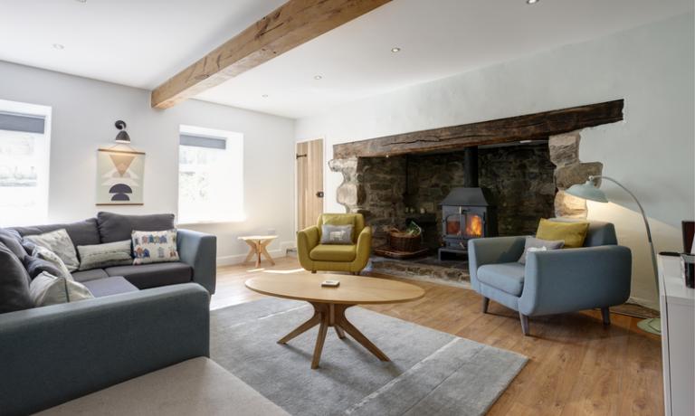  Rustic living area with roaring fire