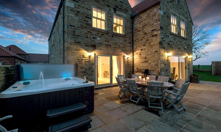 Private outdoor patio with hot tub